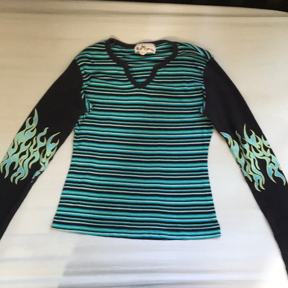 A blue black and white striped t-shirt